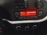 a car dashboard with a red display on it
