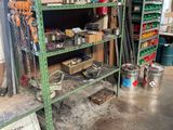 a garage with a lot of tools on the shelves