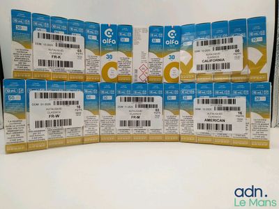 a lot of blue and white tickets sitting on a table