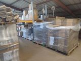 a large warehouse filled with lots of boxes and pallets