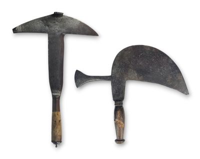 two old tools that are sitting next to each other