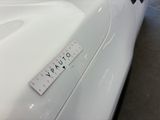 a close up of a sticker on the hood of a car