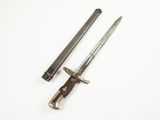 pair of old swords on a white surface with a white background
