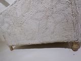 a piece of fabric on the back of a chair