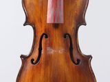 an old violin with a bow on a white background
