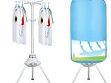 two different types of clothes hanging on a clothes rack