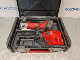 an electric tool in a tool case with a cord cord