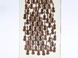 an image of a glass sculpture with a bunch of guitars on it