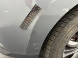 a close up of a car with a sticker on the side of it