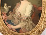 a painting of a woman holding a bird in her hand