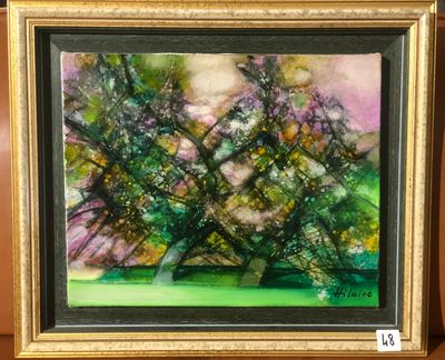 an oil painting of a tree in a frame on a shelf