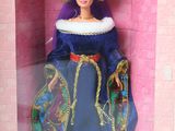 doll in a pink box with a blue dress and a gold crown