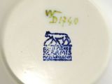 a white plate with a picture of a horse on it