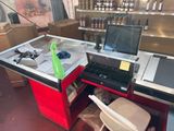 a computer desk with a sink and a laptop on it
