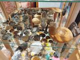 a glass display case filled with different types of rocks