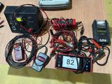 many different types of electronic equipment laid out on a table