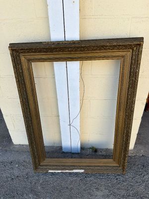 a picture of a picture frame leaning against a wall
