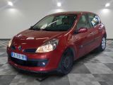 a picture of a red car parked in a garage
