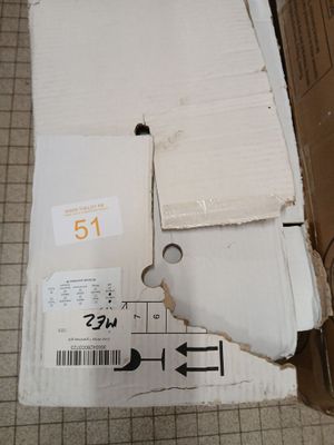 a cardboard box with a piece of paper on top of it