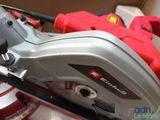 someone is using a circular saw to cut a piece of wood