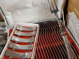 a box with a set of forks and knives in it