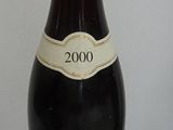 a bottle of wine that is sitting on a table