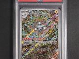gros plan d'une carte pokemon sur une surface noire