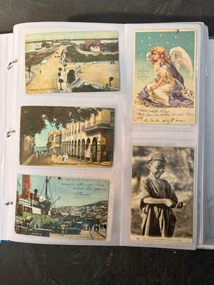 a book with pictures of people on it on a table