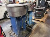 a machine that is sitting on a pallet in a garage