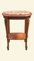 Table de milieu de section ovale en merisier mouluré et scul… (photo 2)