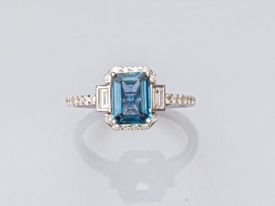 an emerald and diamond ring