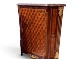 an image of a small chest of drawers in the style of louis ii