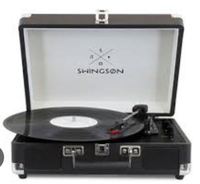 une image représentant une valise avec un tourne-disque et un tourne-disque