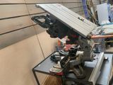 a picture of a table with a saw on it