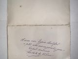 a piece of paper with a handwritten message on it