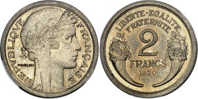 a close up of a coin with a woman ' s head on it