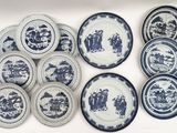 a lot of plates that are sitting on a table