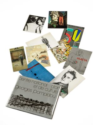 an image of a pile of books sitting on top of a white surface