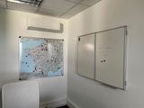 a white board with a map on it in a room