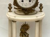 a clock that is sitting on top of a table