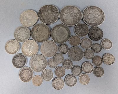 a lot of coins that are on the table