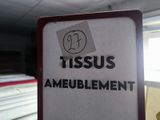 a sign with a sticker on it that says tiss ambulament
