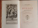 an open book with a picture of a woman on it