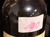 a bottle of liquid sitting on top of a counter