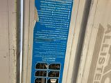 an image of a close up of a door with a sign on it