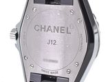 chanel watch with black dial and black bracelet on a white background