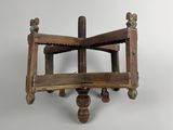 an old wooden shelf with two wooden shelves on top of it