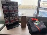 a bag of energy next to a bag of batteries on a table