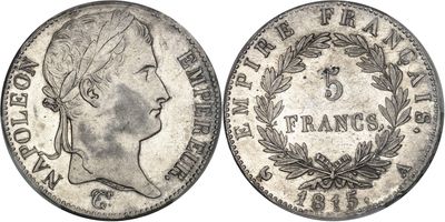 gros plan d'une pièce de monnaie sur laquelle figure un visage de femme