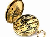 a gold pocket watch with a keychain on a white background